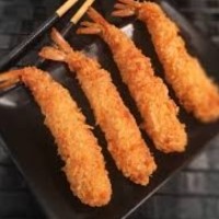 Langostino rebozado en Panko y algas acompañado con salsa de mango y maracuyá especiada - BROCHETAS DE LANGOSTINOS. 4 UNIDADES